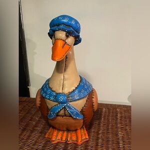 Colorful Ceramic Goose Family Figurines and Mother Goose Cookie jar.